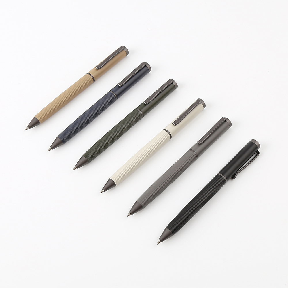 Eleven Durable stainless steel and copper metal pen. (2)