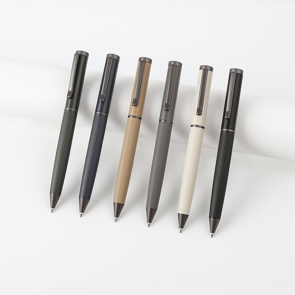 Eleven Durable stainless steel and copper metal pen. (4)